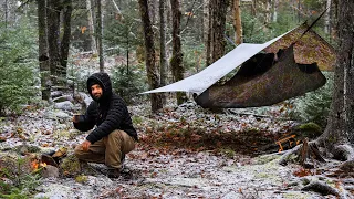 Winter Camping In Snow With Hammock And Campfire Cooking