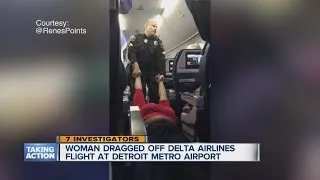 Woman dragged off plane at Metro Airport