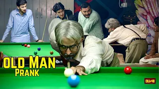 Old Man Playing Snooker