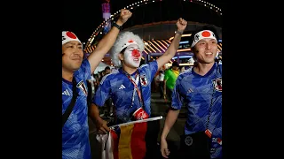 Fans of Japan celebrate after win over Germany