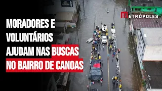 Moradores e voluntários ajudam nas buscas no bairro de Canoas