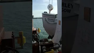 Paddle steamer Waverley bridge sailing up the Thames estuary with pilot on board.