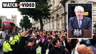 'Bye Bye Boris': Crowd boos and plays music amid UK PM's resignation