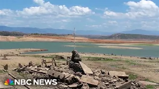 Drone video shows ruins of a centuries-old town revealed by a dried dam