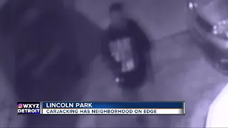 Carjacking at gunpoint caught on video