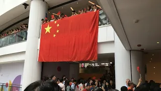 Pro-Beijing supporters gather at Hong Kong mall | AFP