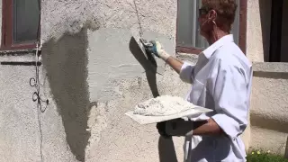 Buckling stucco in front of the home, structural cracks in stucco