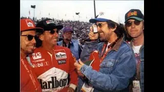 George Harrison sings to Emerson Fittipaldi