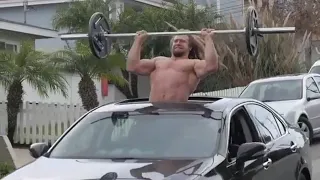 Man Does Weights From Sun Roof Of Car | People Are Awesome