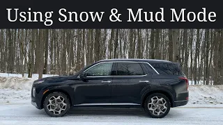Demonstrating Snow and Mud terrain modes for winter driving