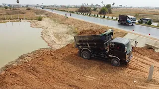 Great work! Land filling Pour soil, clear soil Technique By D31p KOMATSU dozer And Small Dump Trucks