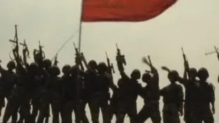 Chinese paratroopers storm island during mass military exercise