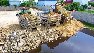 Project Continue 65% by Many Dump Truck 5 Ton and Bulldozer Komatsu Pushing Soil Stone into Water