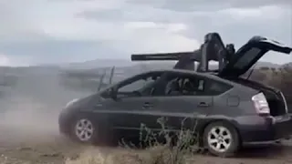 Prius с пулеметом