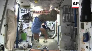 International Space Station crew get into the World Cup spirit with a zero gravity kick-about
