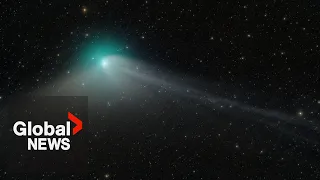 Astronomers view "green comet" in closest pass to Earth in 50,000 years