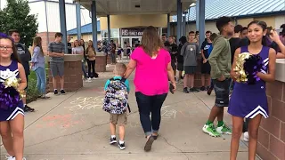 Cops escort son of fallen officer to school