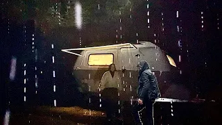 CARAVAN CAMPING IN THE HIGH MOUNTAINS IN RAIN AND SNOW