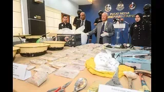 Bukit Aman storm Penang drug labs, seize 23kg of heroin