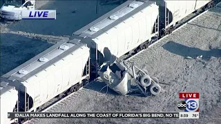 18-wheeler split in half in crash with train in Porter, video shows