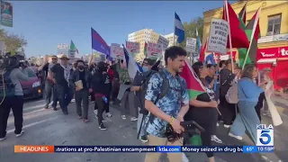 Workers celebrate May Day with Hollywood march and rally