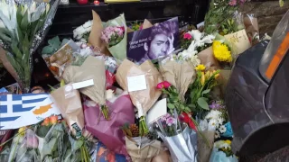 People paying tribute and mourning at George Michael's London residence