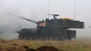 Soldiers Load And Fire The M109A6 Paladin 155-mm Self-Propelled Howitzer