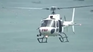 An armed PNP Airbus H125 helicopter during an aerial gunnery exercise at the PNP Academy