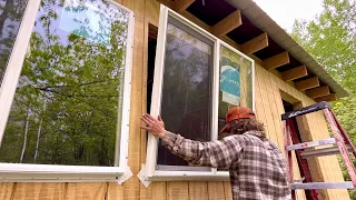 Simple Mortgage Free Cabin Build: Installing Windows, Cutting Opening For Addition