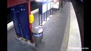 Man unconciousness on train tracks mugged then survives being run over