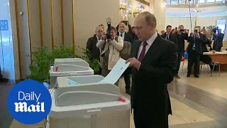 Vladimir Putin votes in 2018 Russian presidential election - Daily Mail