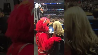 Benny the bull running game at a reporter