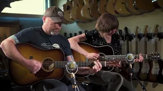 Molly Tuttle and Adam Chowning with their Preston Thompson guitars