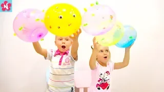 Nil and Nelly playing Golf and open Oober Oonies balloons, learn colors