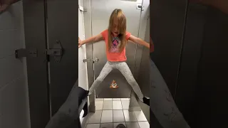 Kid climbs bathroom stall while mom poops #shorts