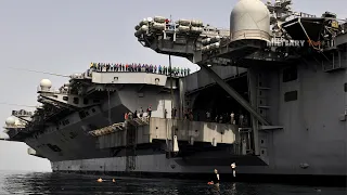 How many people live on an aircraft carrier