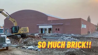 Old school gym completely demolished by Caterpillar excavator