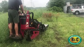 Richey & Clapper Cuts through Heavy Brush with the Brush Wolf 4200 Brush Hog attachment on a Toro