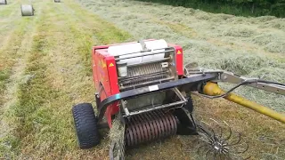 Kubota compact tractor and mini round baler