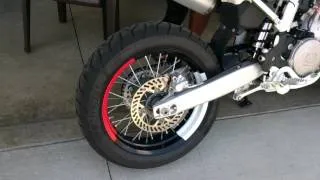 Husqvarna supermoto alpina style wheels.