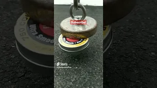 Giant magnet lifting a cannister of bb's in slow motion  #slowmotion #magnetfishing #youtubeshorts