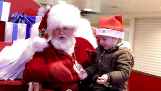 Santa signing to child