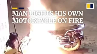 Drunk man in China lights his own motorcycle on fire