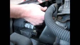 How to change the headlight bulbs on a Peugeot (shown on a Peugeot 206)