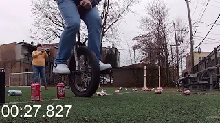 Most Cans Crushed on a Unicycle in One Minute