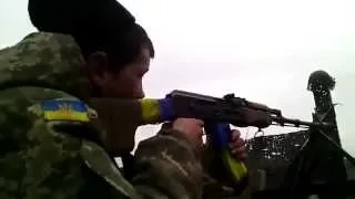 Ukraine War / Ukrainian soldiers firing on positions militias