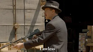 Lawless: Local gangster Floyd Banner (Gary Oldman) shoots a car chasing him point-blank