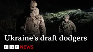 Ukrainian men flee draft in their thousands - BBC News