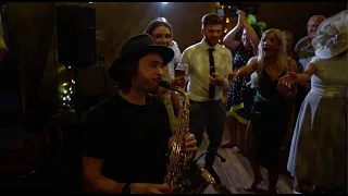 Sax player surprises the groom at his wedding!