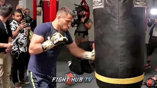 VASYL LOMACHENKO THROWING BEAUTIFUL HOOKS ON HEAVY BAG AS HE TRAINS FOR JORGE LINARES